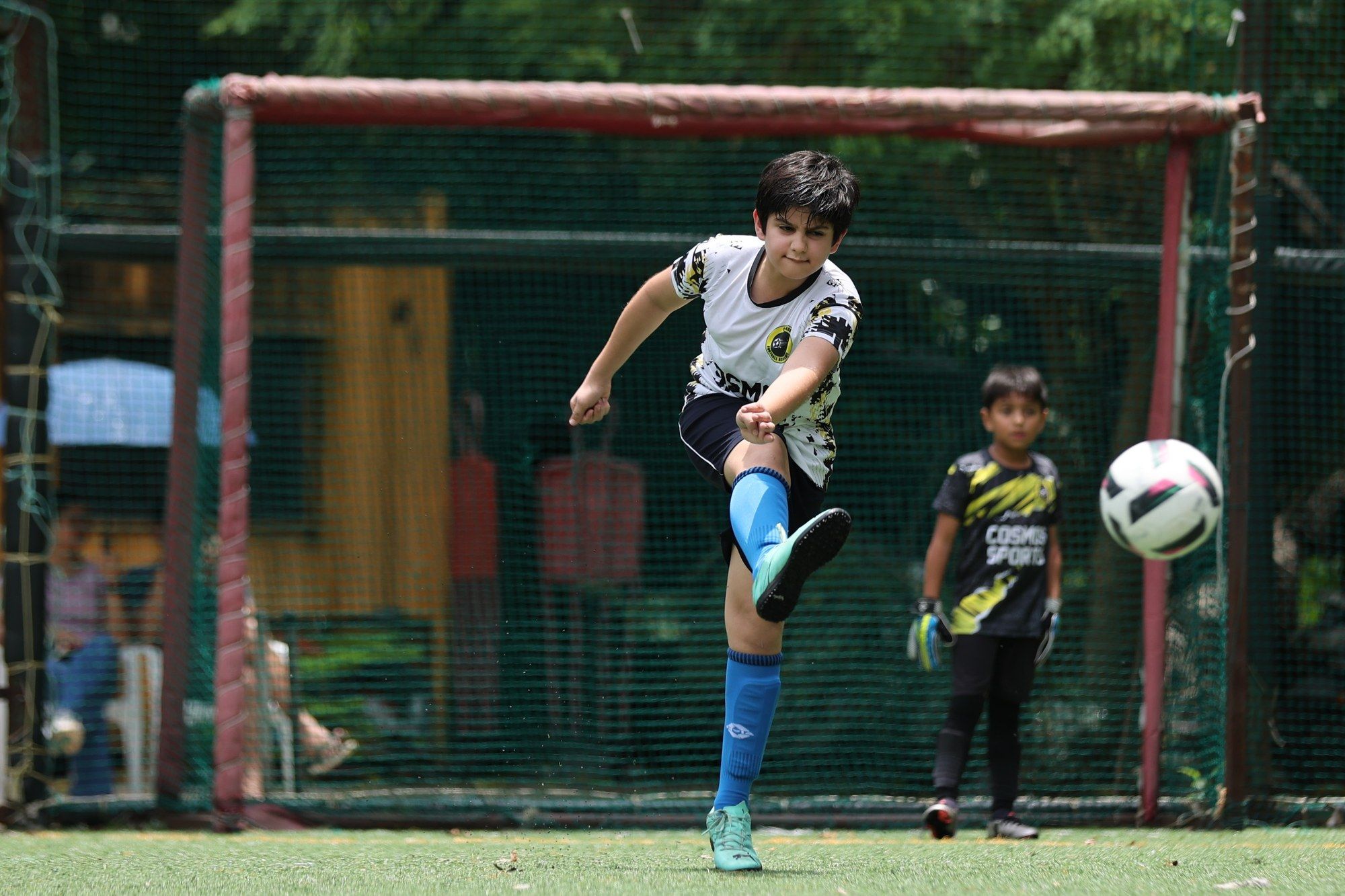 A shot at goal in front of the net
