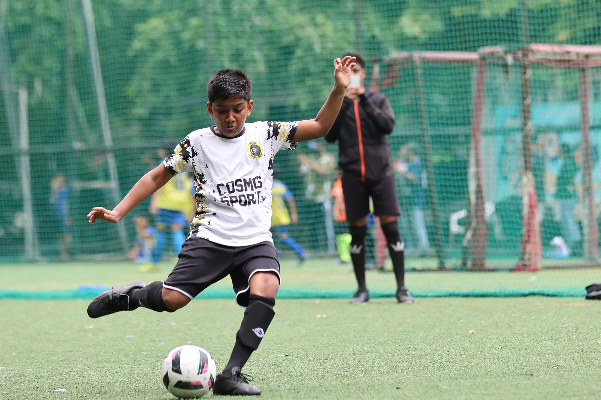 A player shaping to kick the ball