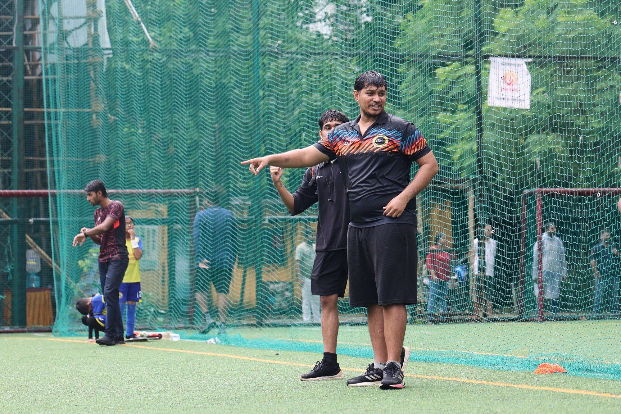 Deepak Joshi pointing out instructions from the touchline