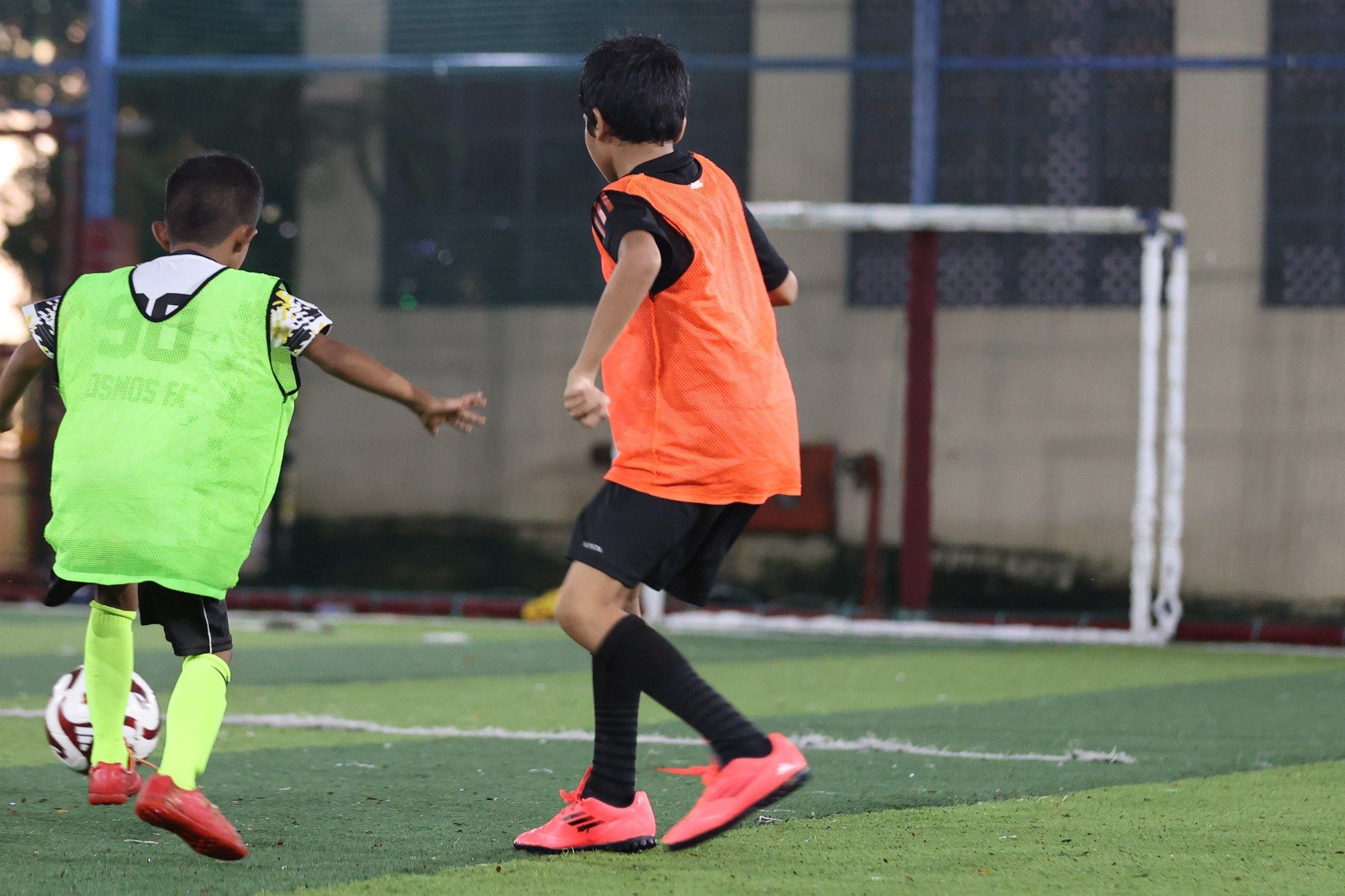 Players in bibs during a small-sided game
