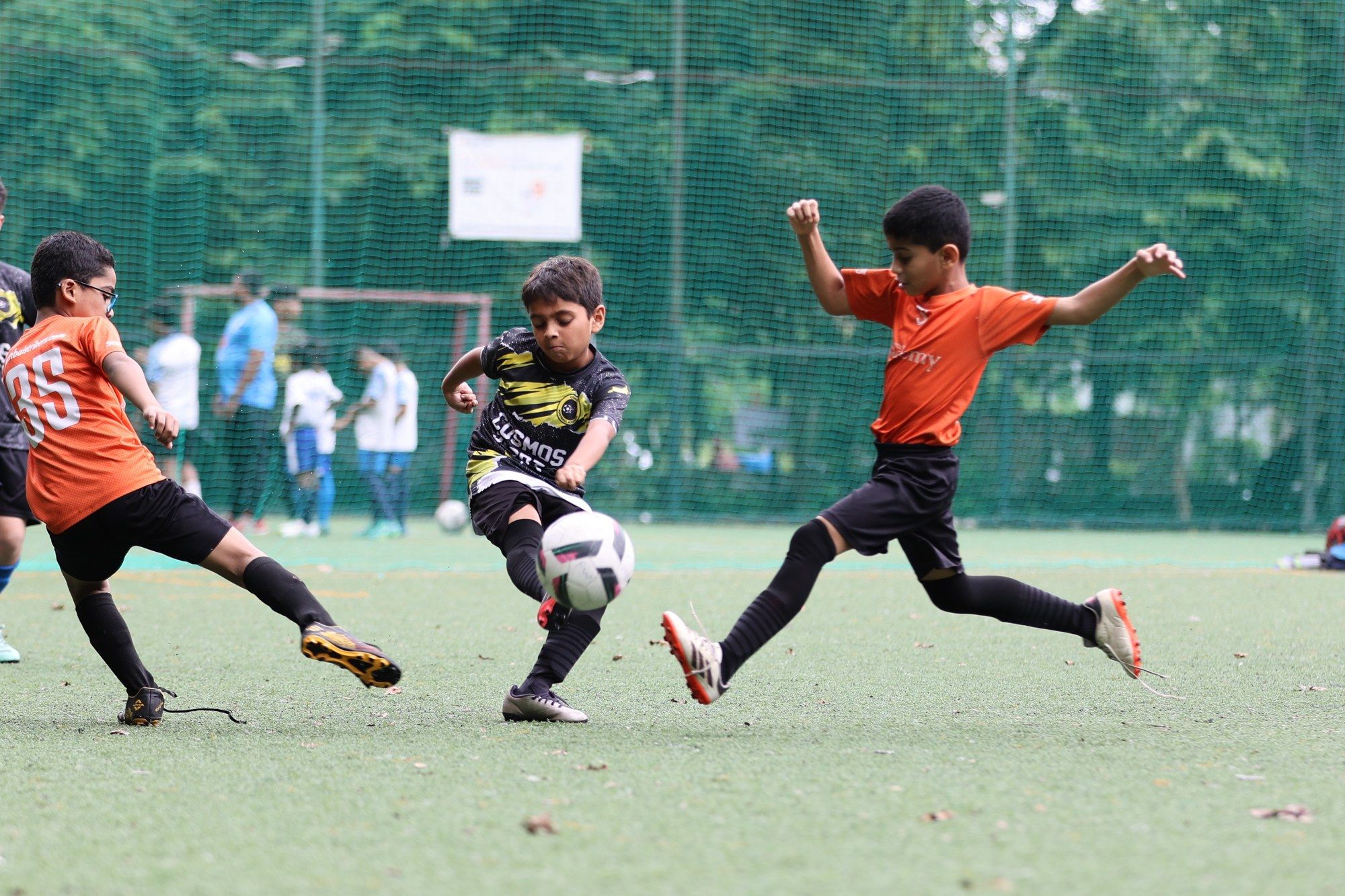 Players stretching for the ball