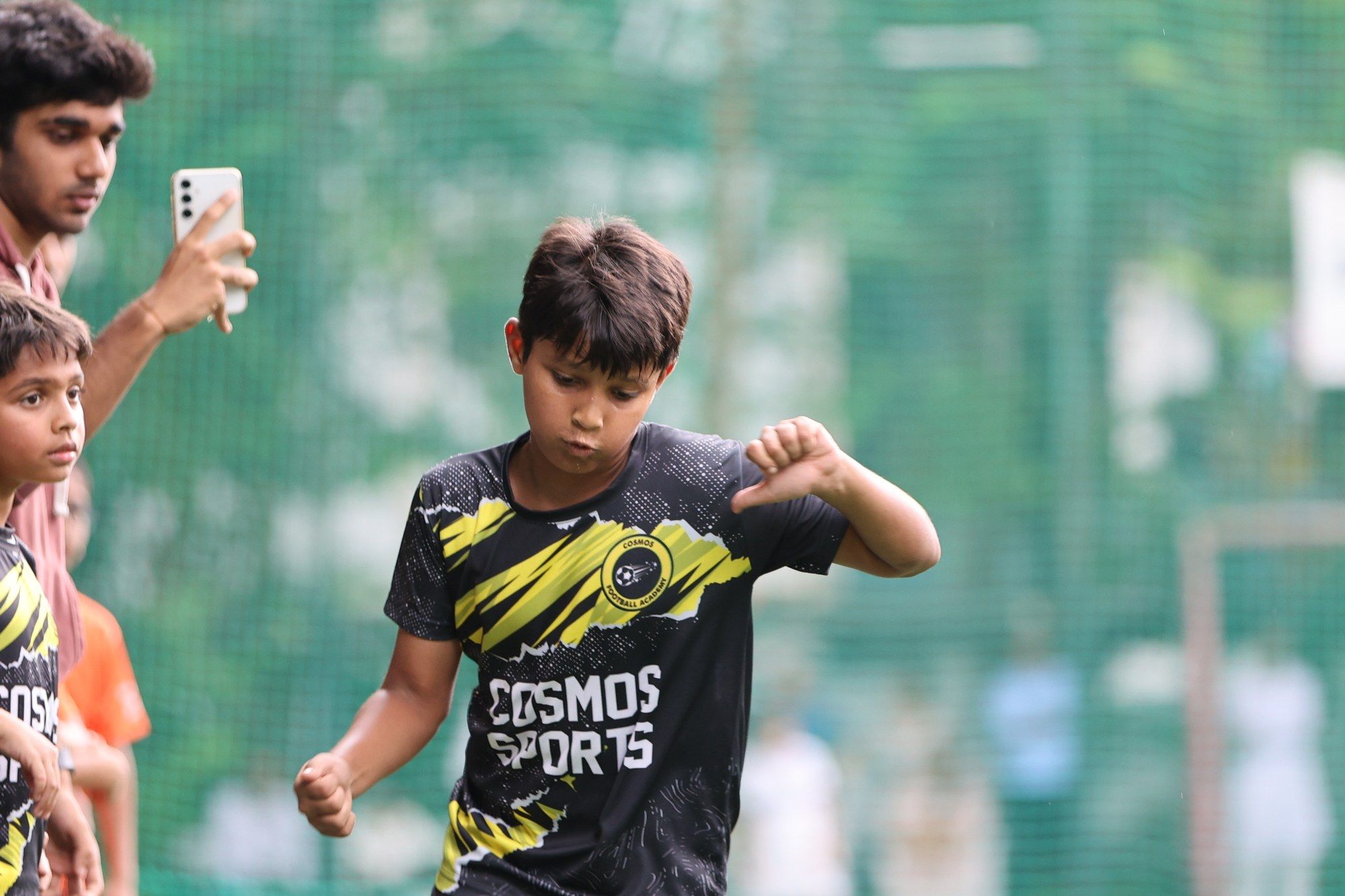 A player pointing to where the ball should go