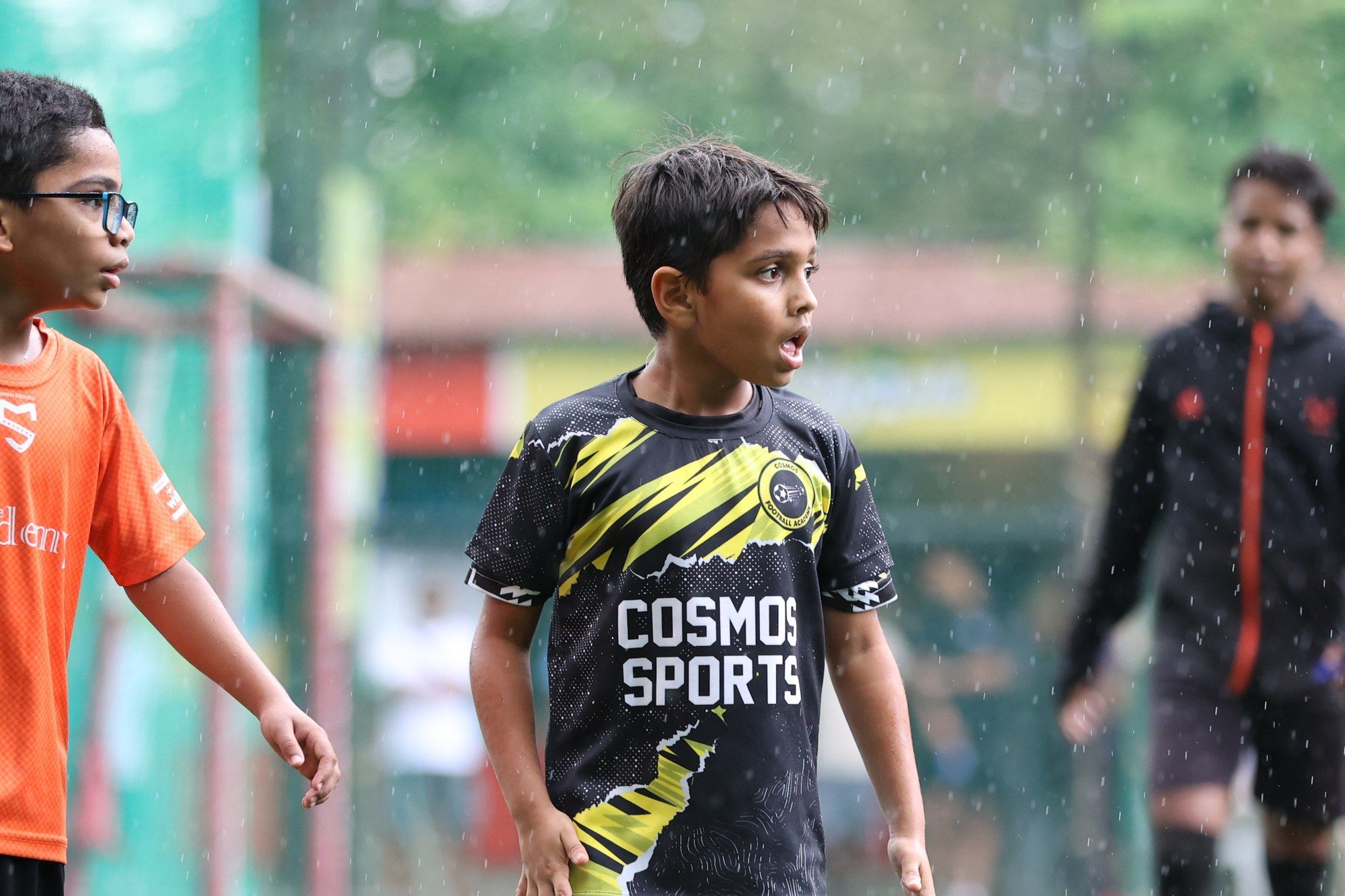 A young Cosmos player looking across the pitch