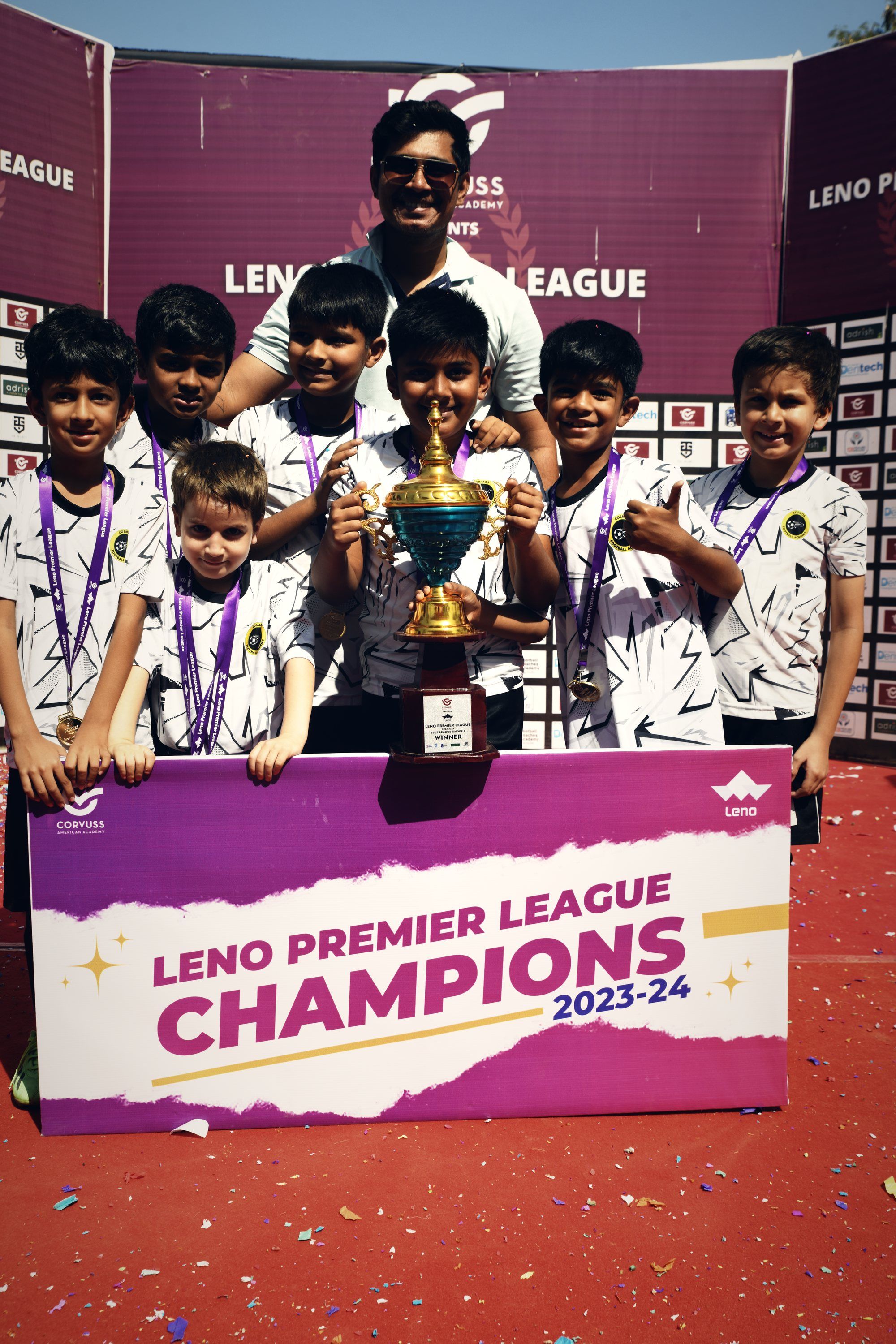 U13 squad with the trophy